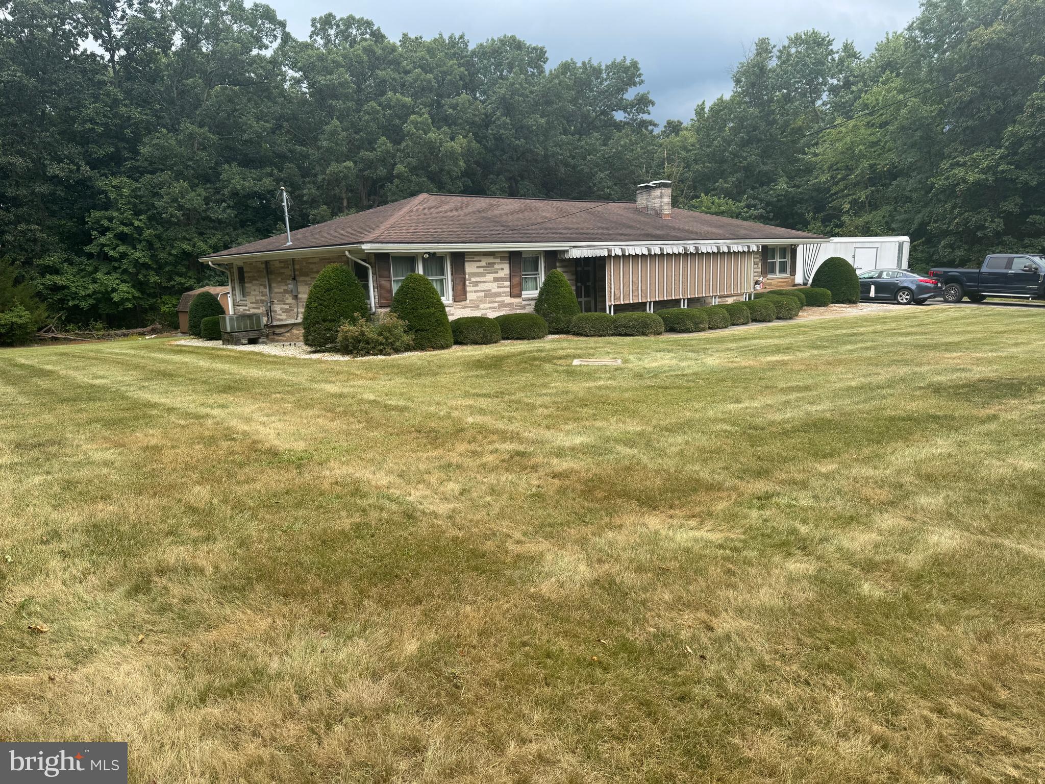1500 Ridge Road Wellsville, PA 17365 - Photo 3 of 56 a front view of a house with a yard