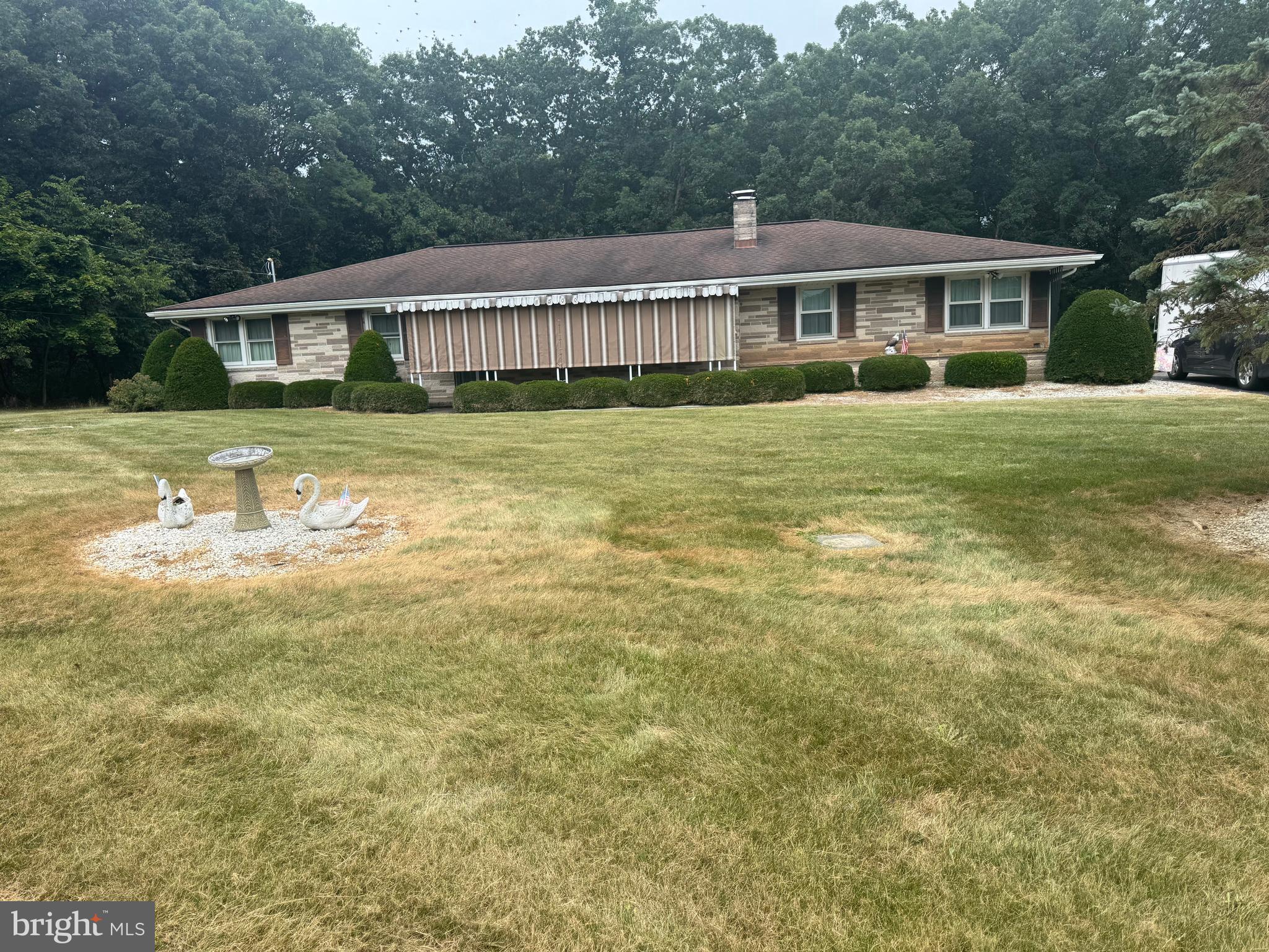 1500 Ridge Road Wellsville, PA 17365 - Photo 4 of 56 a front view of a house with a yard