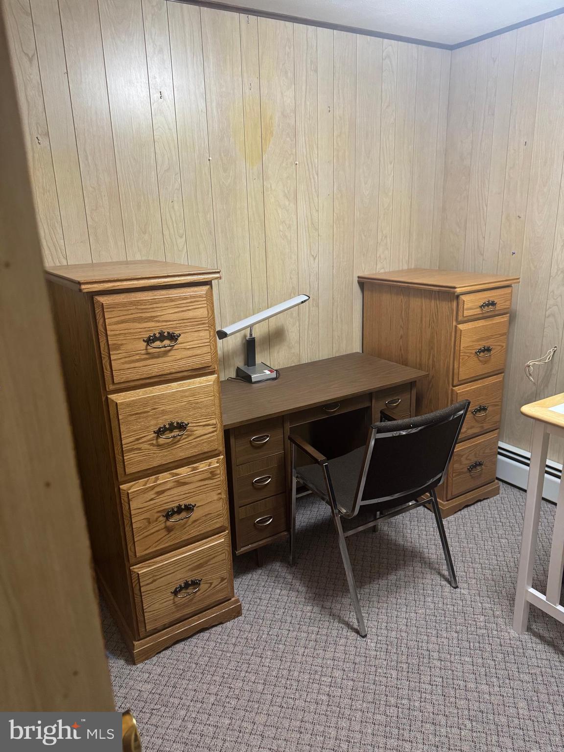 1500 Ridge Road Wellsville, PA 17365 - Photo 52 of 56 a room with a chair and a table in it