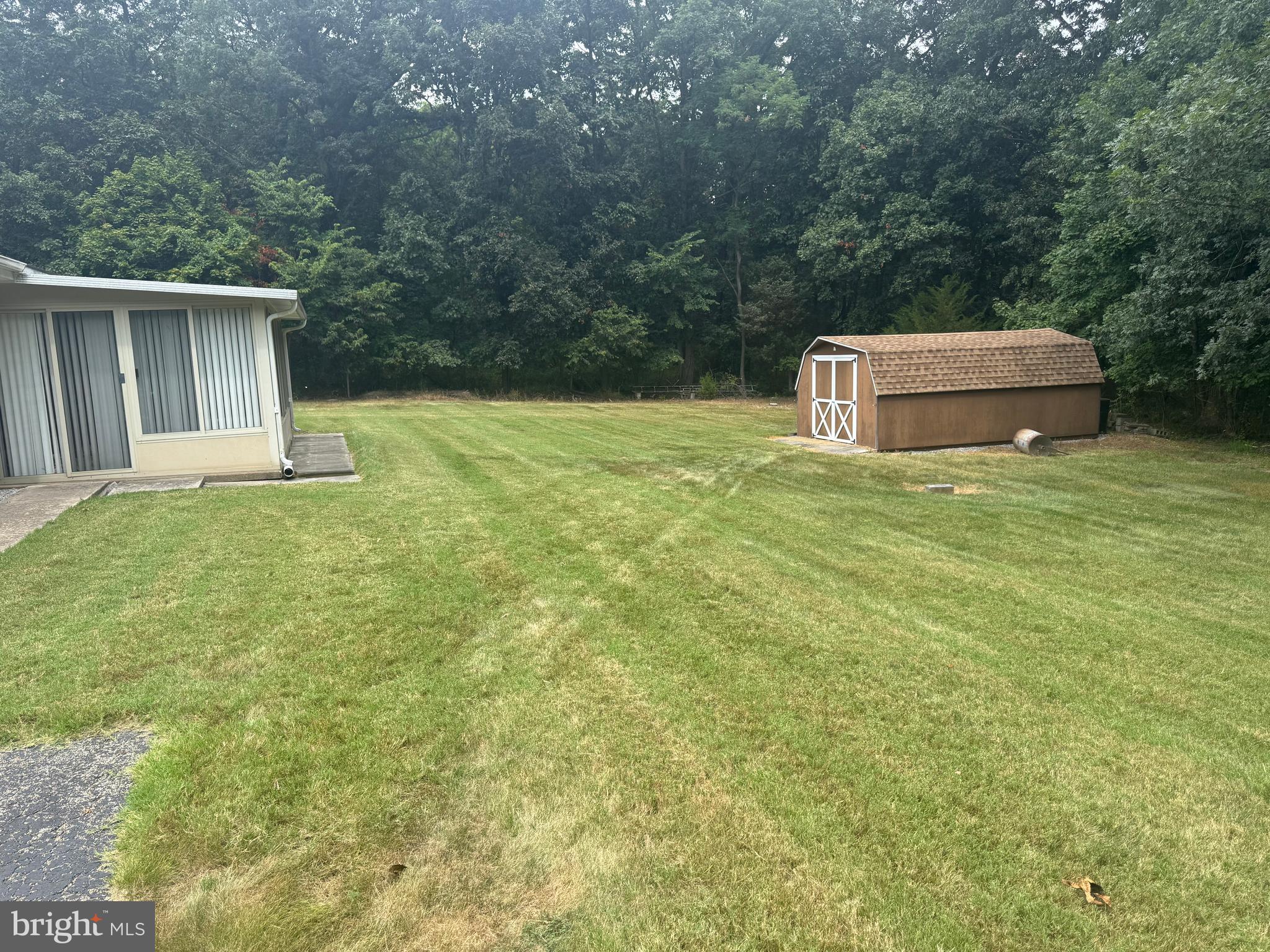 1500 Ridge Road Wellsville, PA 17365 - Photo 6 of 56 a house with green field and trees
