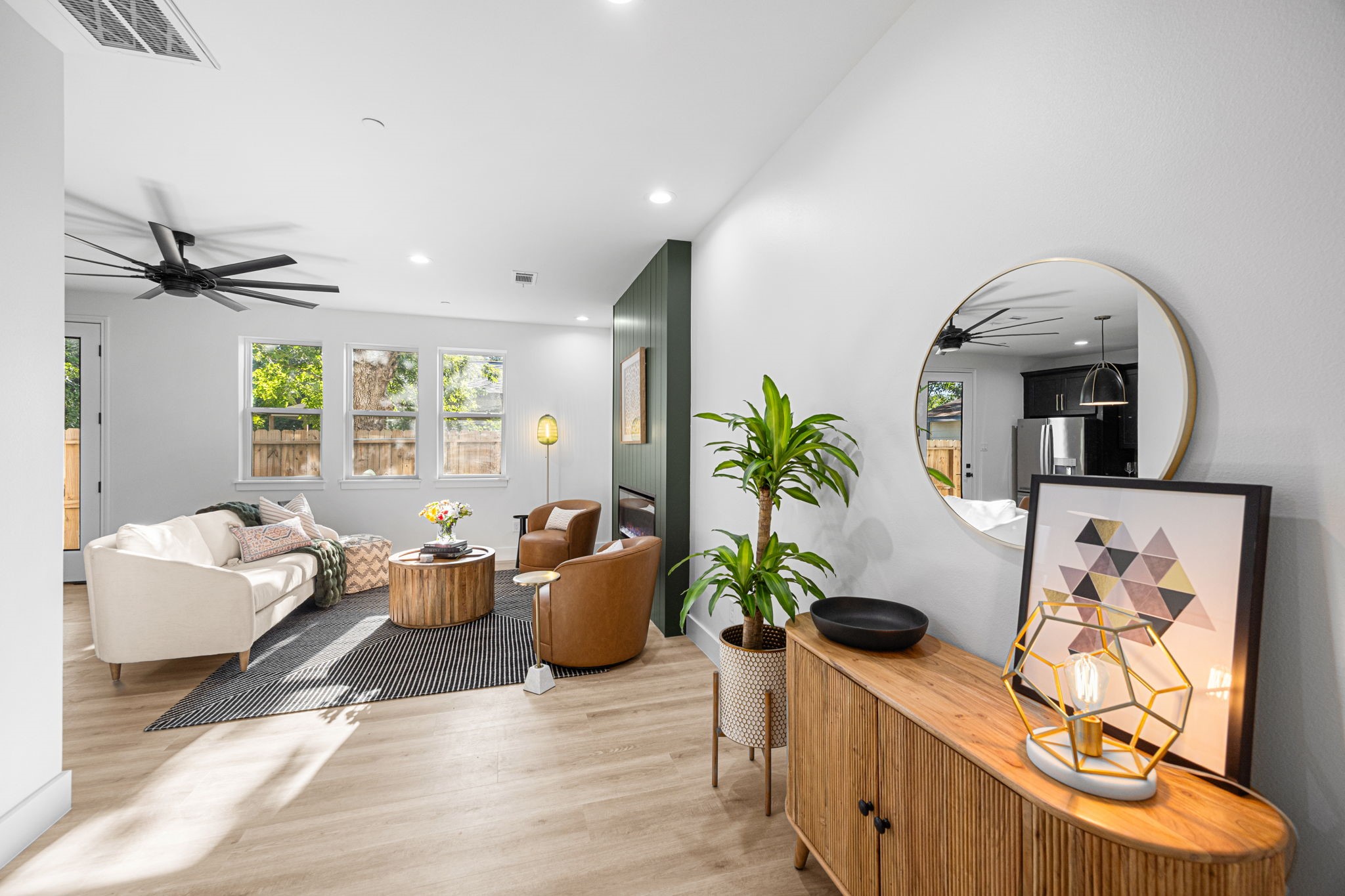 4611 Dewberry Street, Unit C Houston, TX 77021 - Photo 20 of 34 a living room with furniture potted plant and a window