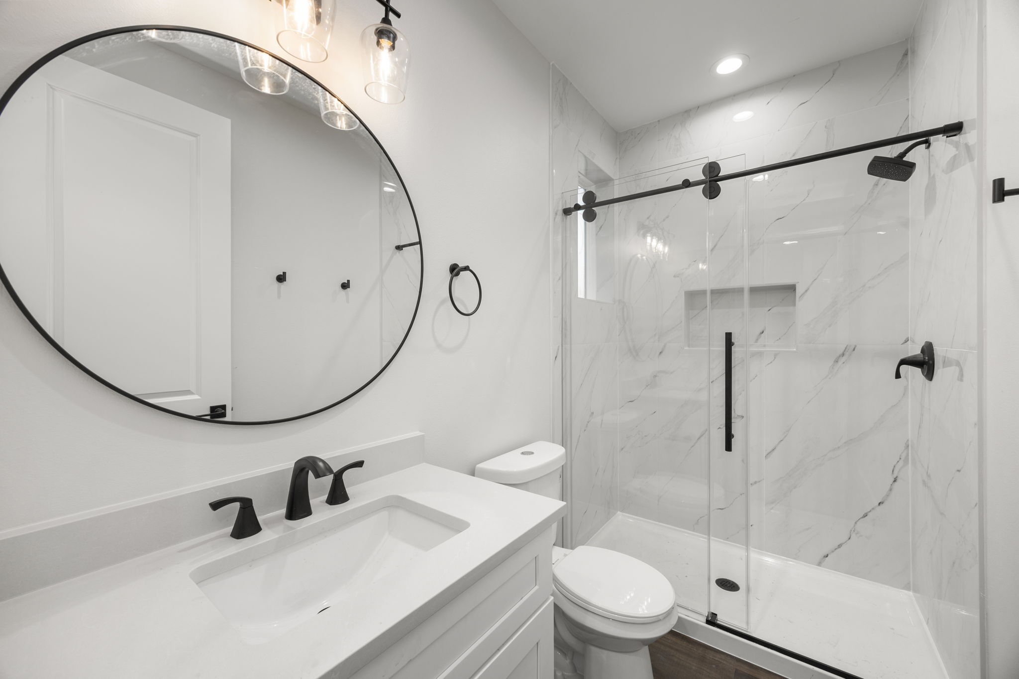 4611 Dewberry Street, Unit C Houston, TX 77021 - Photo 7 of 34 a bathroom with a sink a toilet and a mirror
