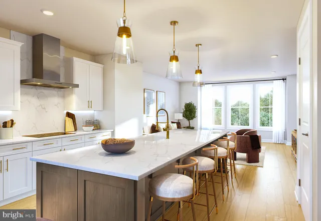 a kitchen with sink a table and chairs