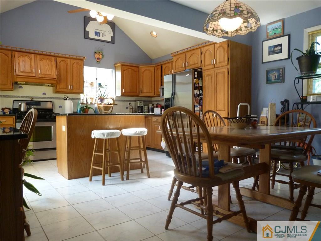 45 South Pennington Road New Brunswick, NJ 08901 - Photo 5 of 21 a view of a dining room with furniture and chandelier
