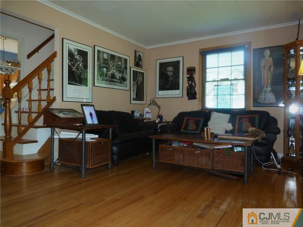 45 South Pennington Road New Brunswick, NJ 08901 - Photo 6 of 21 a living room with furniture and a window