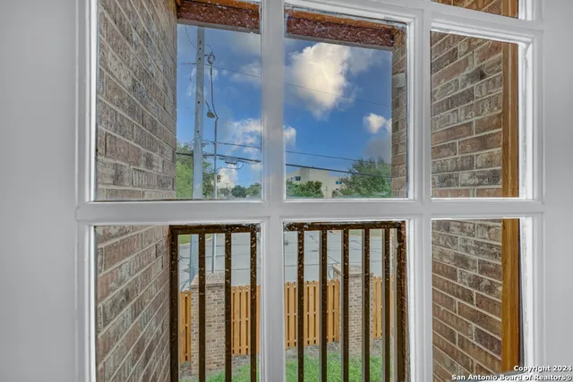 a view of a glass door with a door