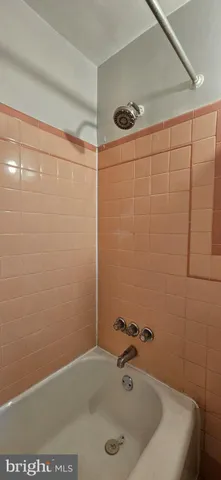 a bathroom with a sink and a tub