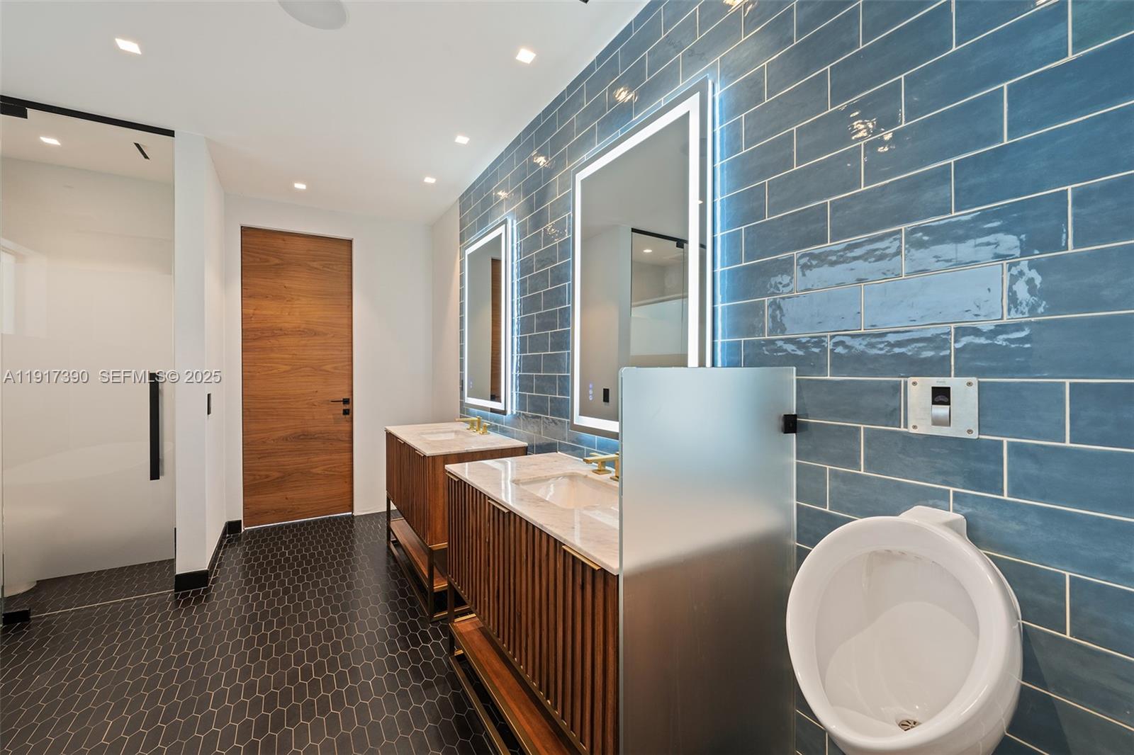 900 Washington Street Hollywood, FL 33019 - Photo 33 of 61 a bathroom with a sink a toilet and shower