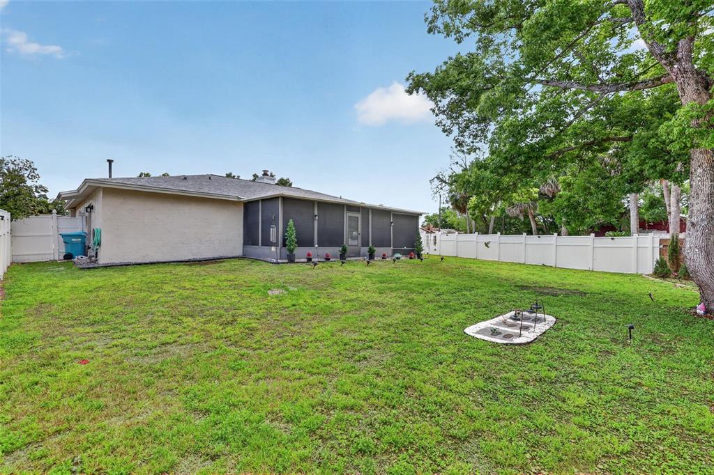 575 Tiberon Cove Road Longwood, FL 32750 - Photo 47 of 56 a view of a house with a backyard
