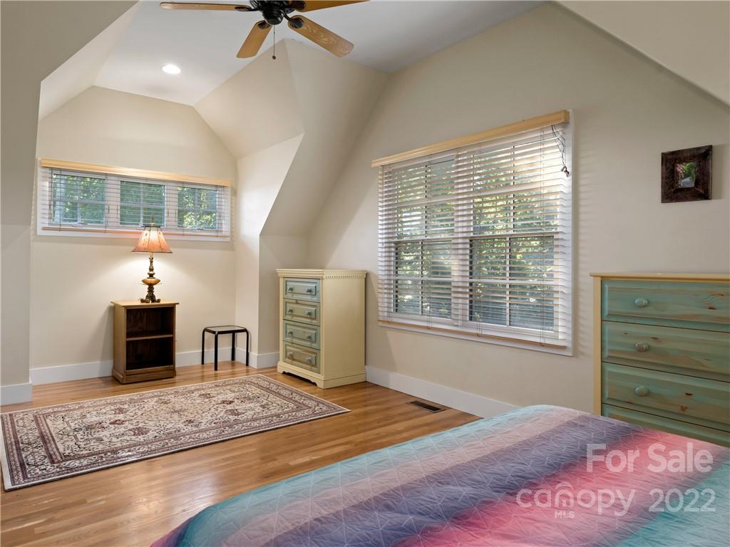 116 Stone Brook Trail Black Mountain, NC 28711 - Photo 18 of 48 a bedroom with furniture and a window