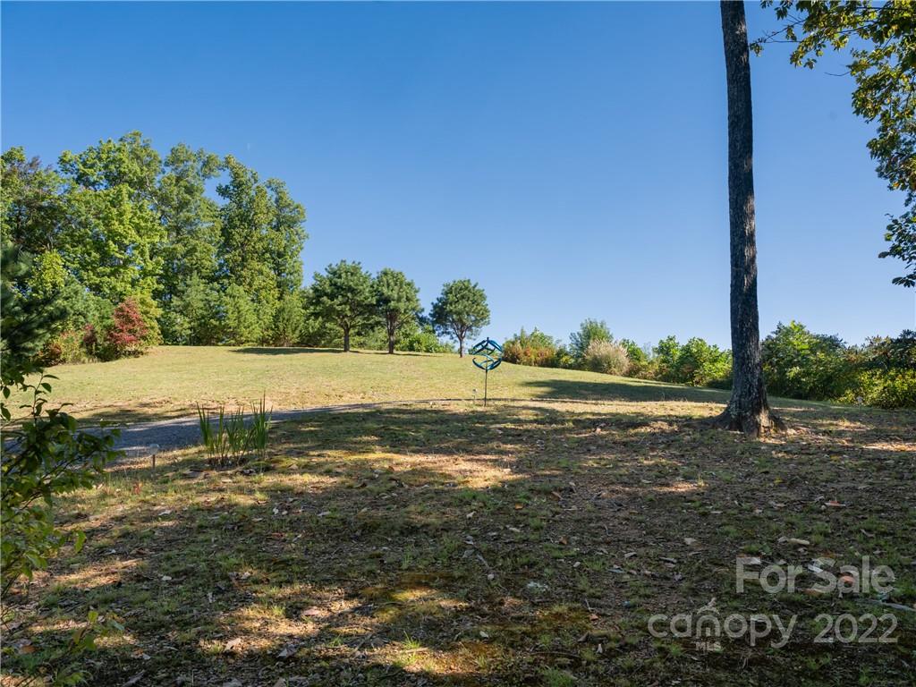 116 Stone Brook Trail Black Mountain, NC 28711 - Photo 23 of 48 a view of an ocean and beach
