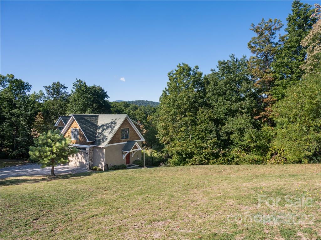 116 Stone Brook Trail Black Mountain, NC 28711 - Photo 3 of 48 an aerial view of house with yard