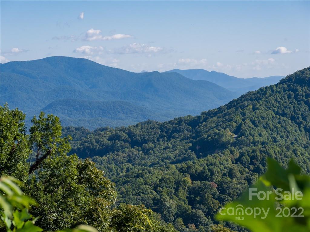 116 Stone Brook Trail Black Mountain, NC 28711 - Photo 33 of 48 a view of a lush green mountain in the distance
