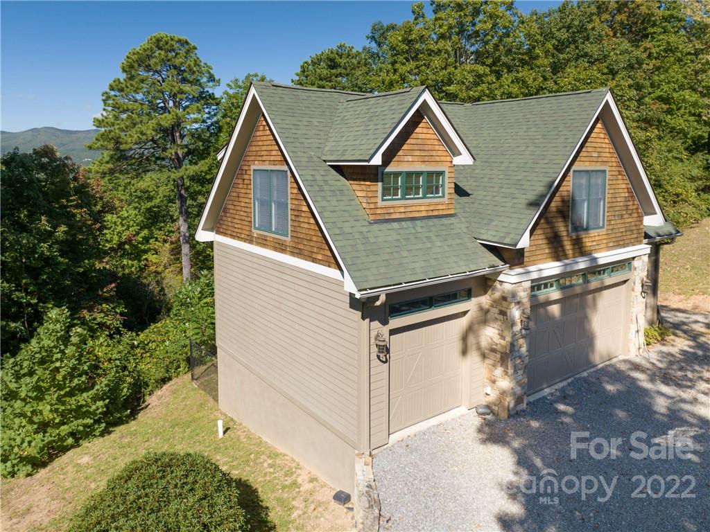 116 Stone Brook Trail Black Mountain, NC 28711 - Photo 42 of 48 a view of a house with a yard