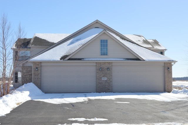 10187 Marblewing Road, Unit 2 Roscoe, IL 61073 - Photo 1 of 12 a house with a outdoor space