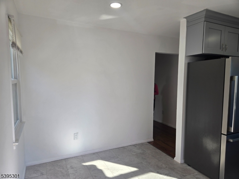 14 West Sterling Street, Unit 2 Wharton, NJ 07885 - Photo 14 of 35 a view of cabinets and refrigerator
