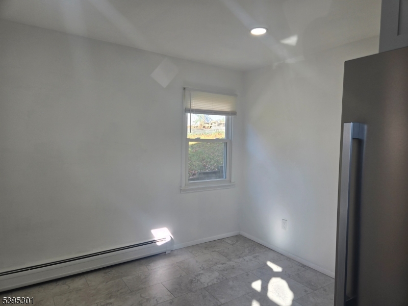 14 West Sterling Street, Unit 2 Wharton, NJ 07885 - Photo 16 of 35 an empty room with windows