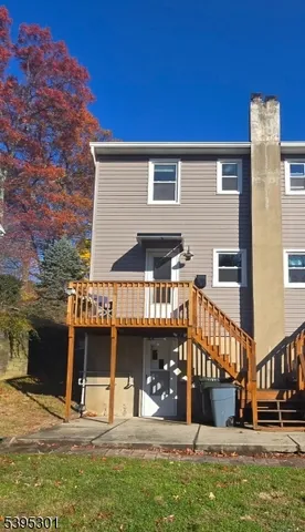 a view of a house with a street