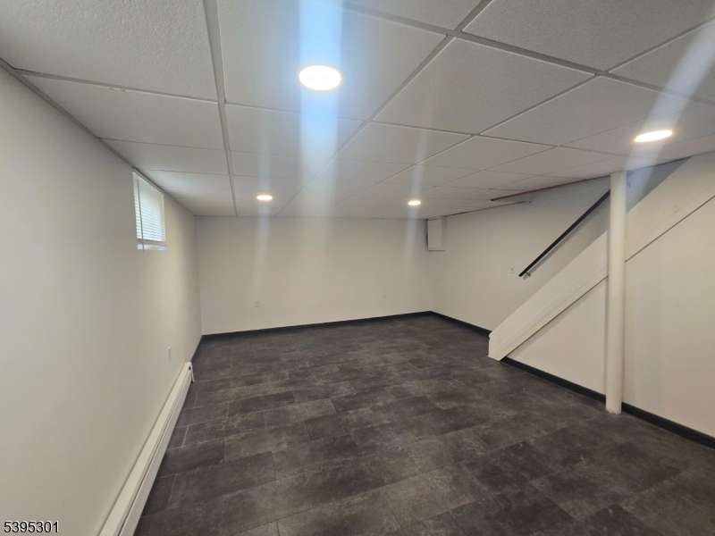 14 West Sterling Street, Unit 2 Wharton, NJ 07885 - Photo 34 of 35 wooden floor in an empty room