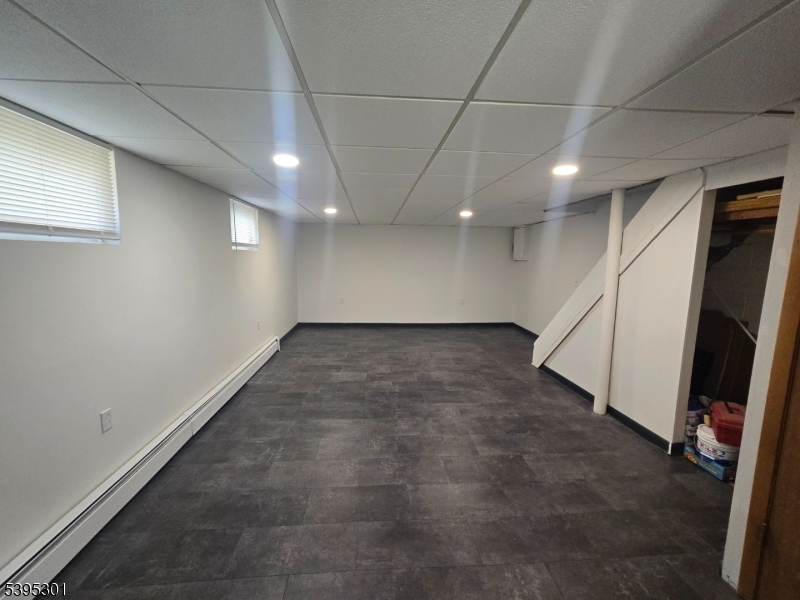 14 West Sterling Street, Unit 2 Wharton, NJ 07885 - Photo 35 of 35 an empty room with stairs