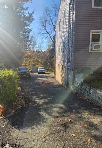 a view of a street with some trees