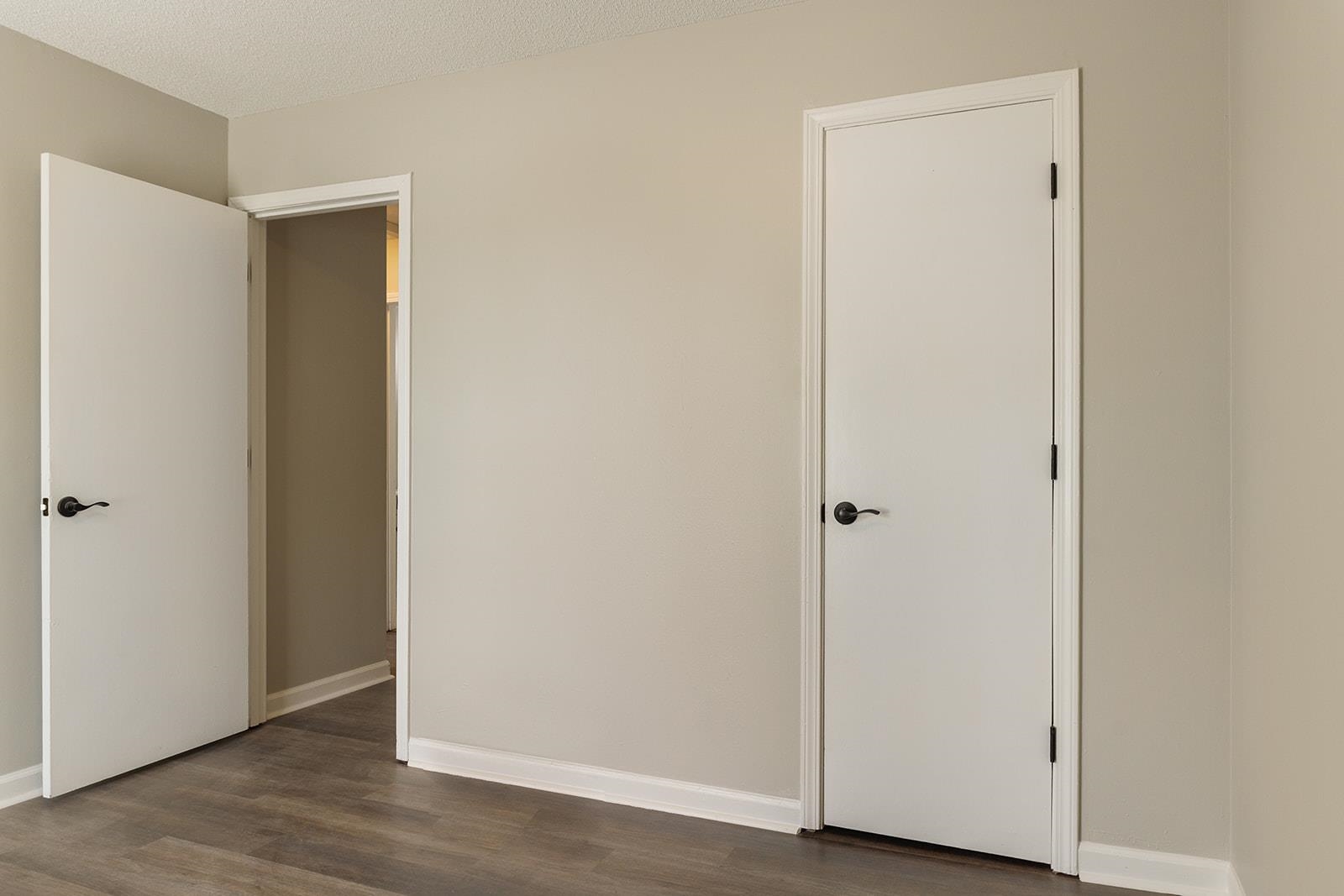 6976 Rockingham Road Memphis, TN 38125 - Photo 18 of 24 a view of a hallway with wooden floor