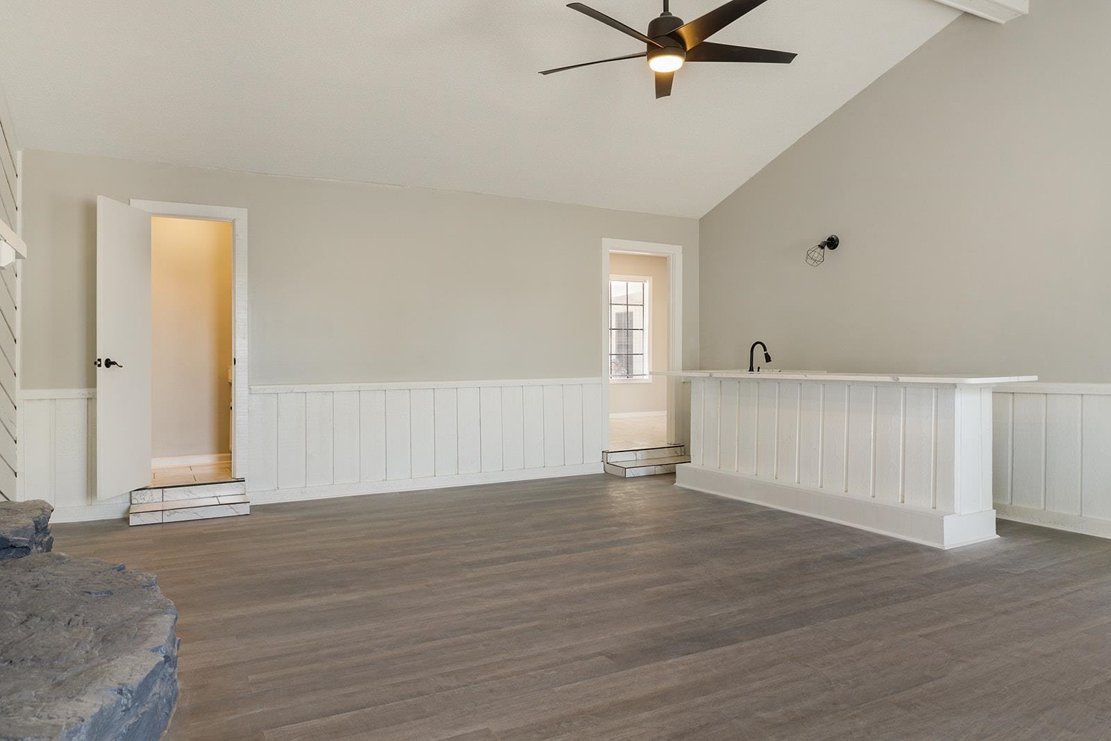 6976 Rockingham Road Memphis, TN 38125 - Photo 21 of 24 a view of an empty room with wooden floor and a window