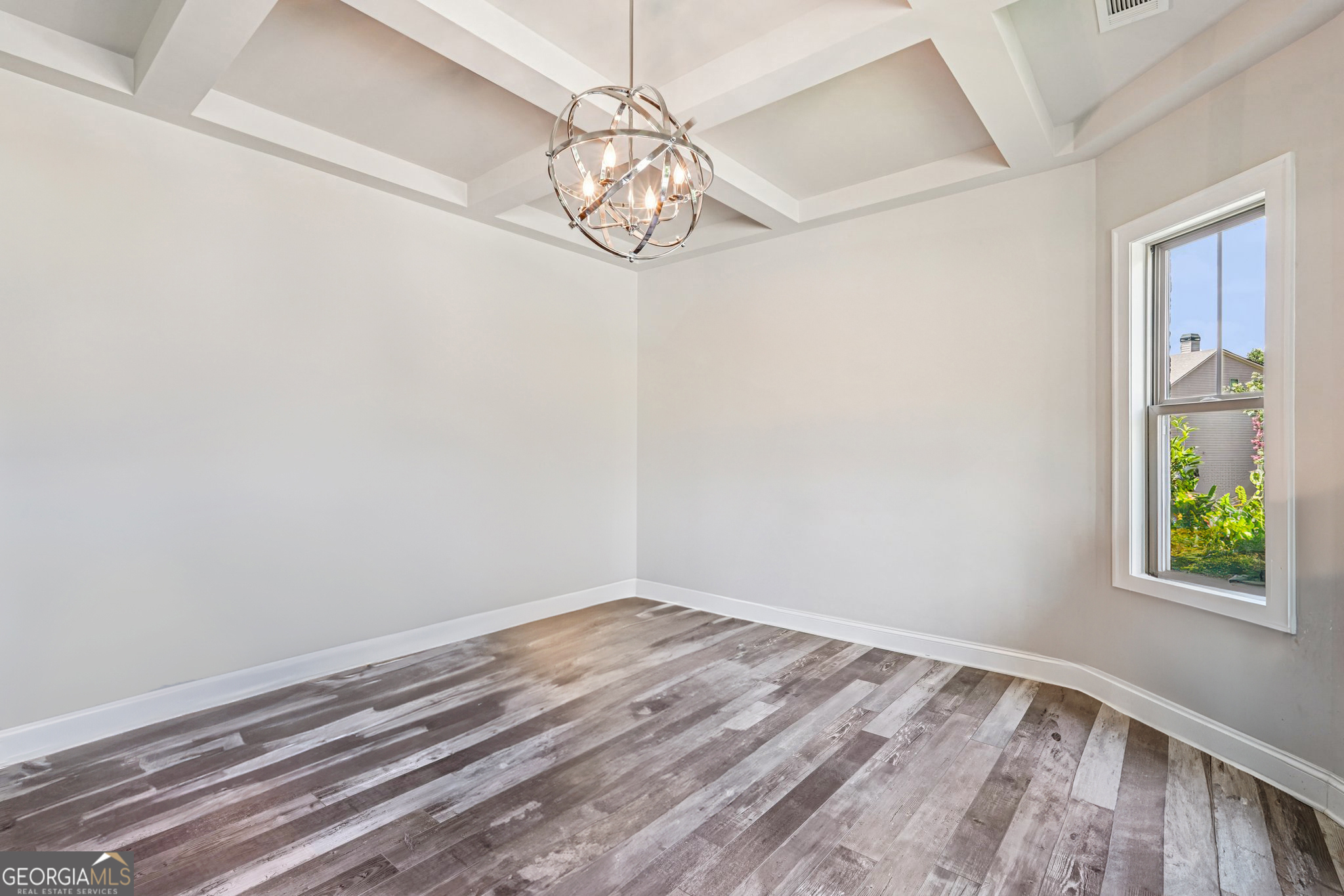 17 Lake Sydney Drive Dawsonville, GA 30534 - Photo 23 of 100 wooden floor in an empty room with a window