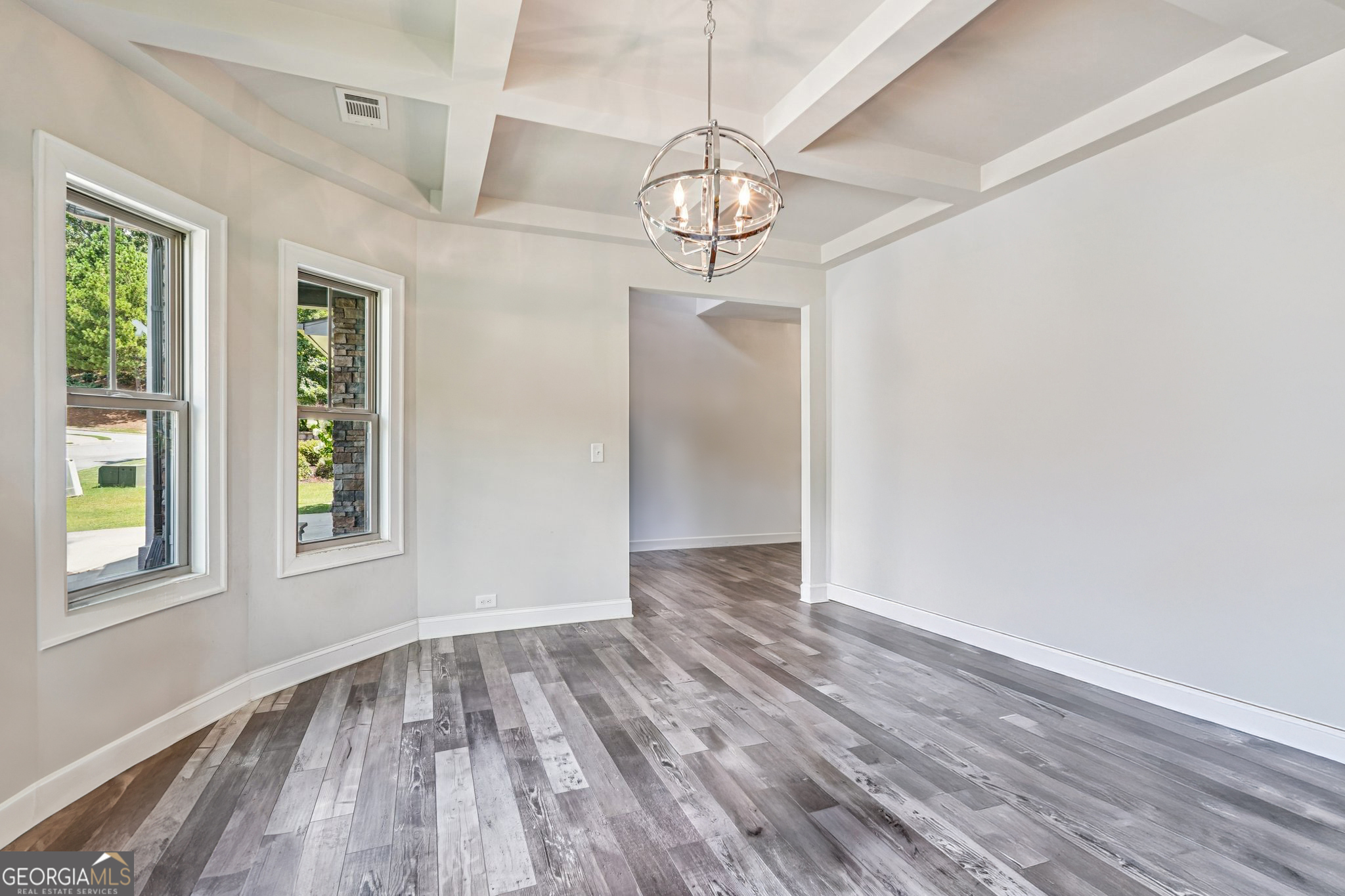 17 Lake Sydney Drive Dawsonville, GA 30534 - Photo 24 of 100 a view of an empty room with wooden floor and a window