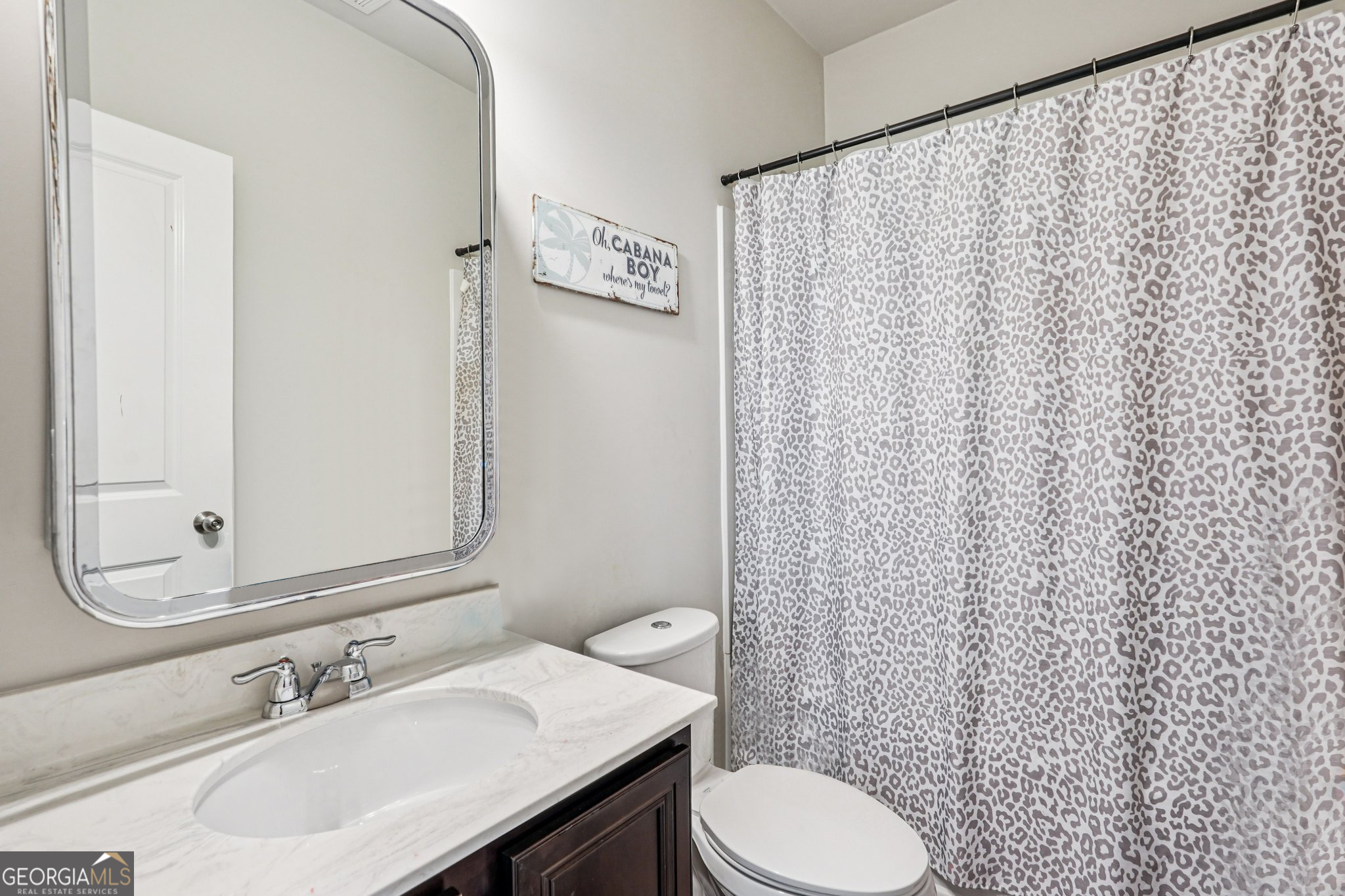 17 Lake Sydney Drive Dawsonville, GA 30534 - Photo 30 of 100 a bathroom with a sink a toilet and a mirror