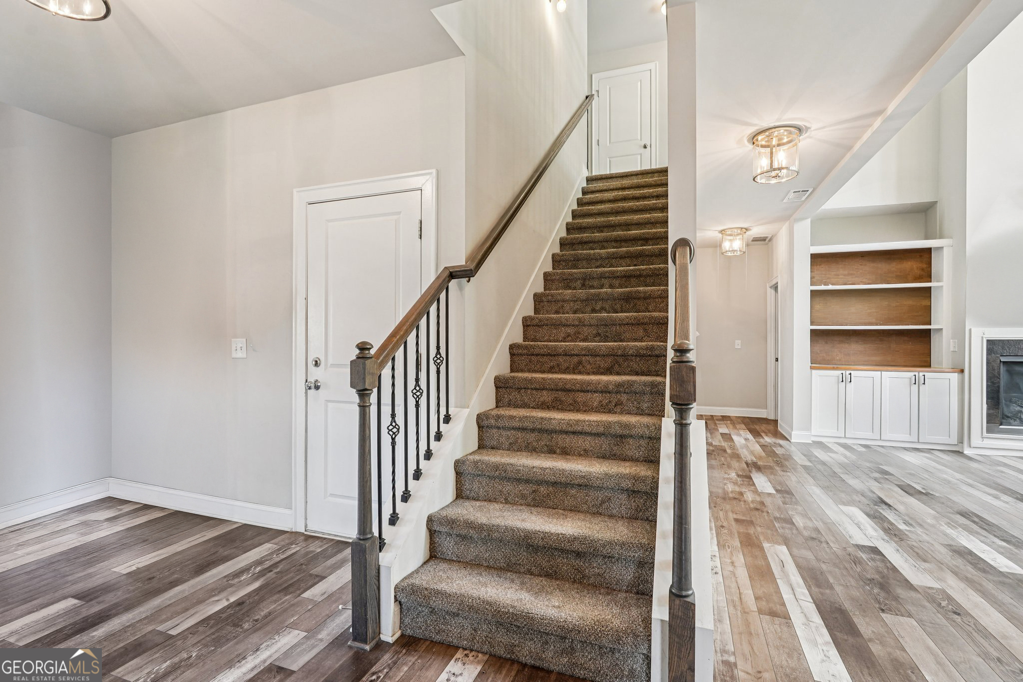 17 Lake Sydney Drive Dawsonville, GA 30534 - Photo 31 of 100 a view of a hallway with wooden floor and entryway