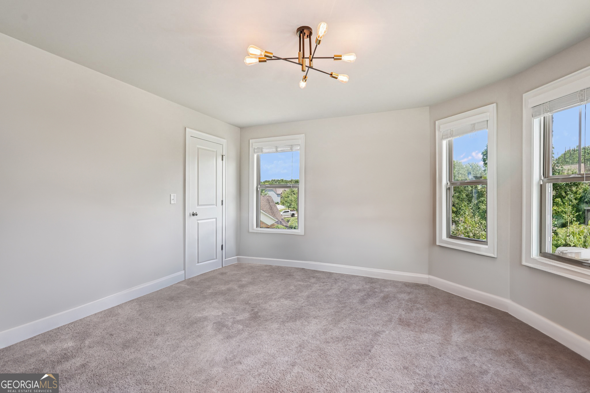 17 Lake Sydney Drive Dawsonville, GA 30534 - Photo 35 of 100 a view of an empty room with a window