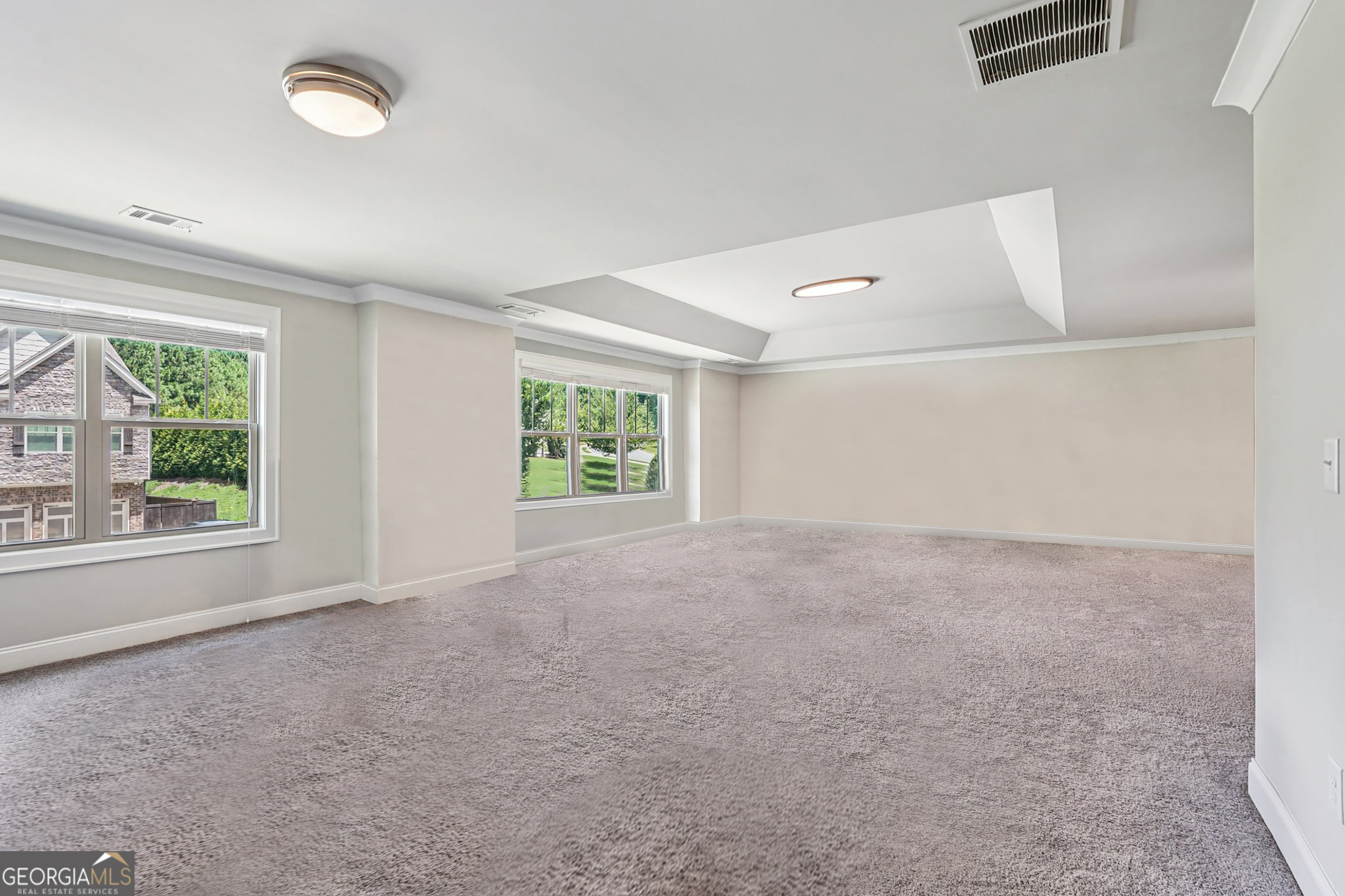 17 Lake Sydney Drive Dawsonville, GA 30534 - Photo 47 of 100 an empty room with windows and view of lake
