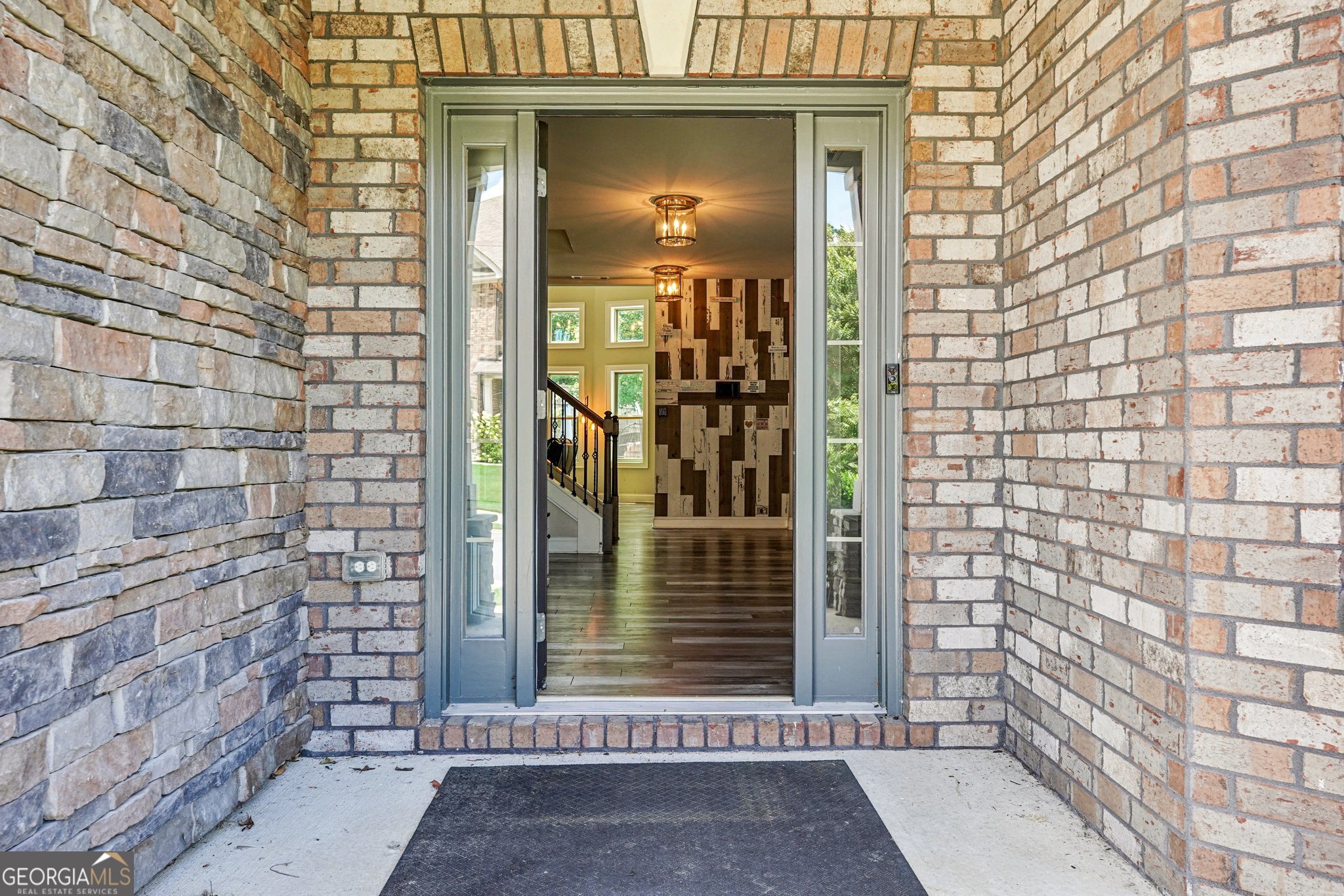 17 Lake Sydney Drive Dawsonville, GA 30534 - Photo 5 of 100 a view of a wooden door of the house