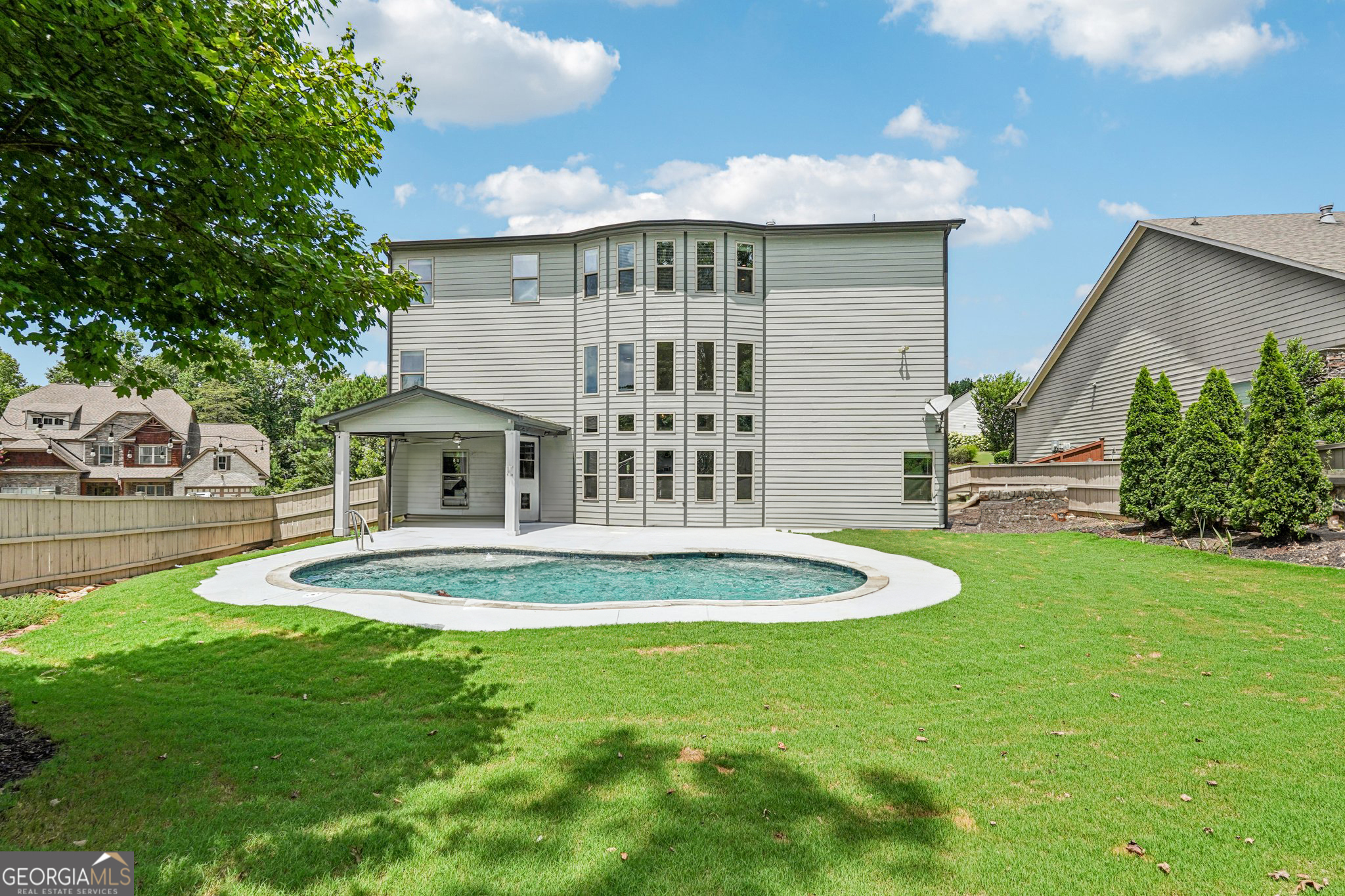 17 Lake Sydney Drive Dawsonville, GA 30534 - Photo 71 of 100 a front view of a house with a yard