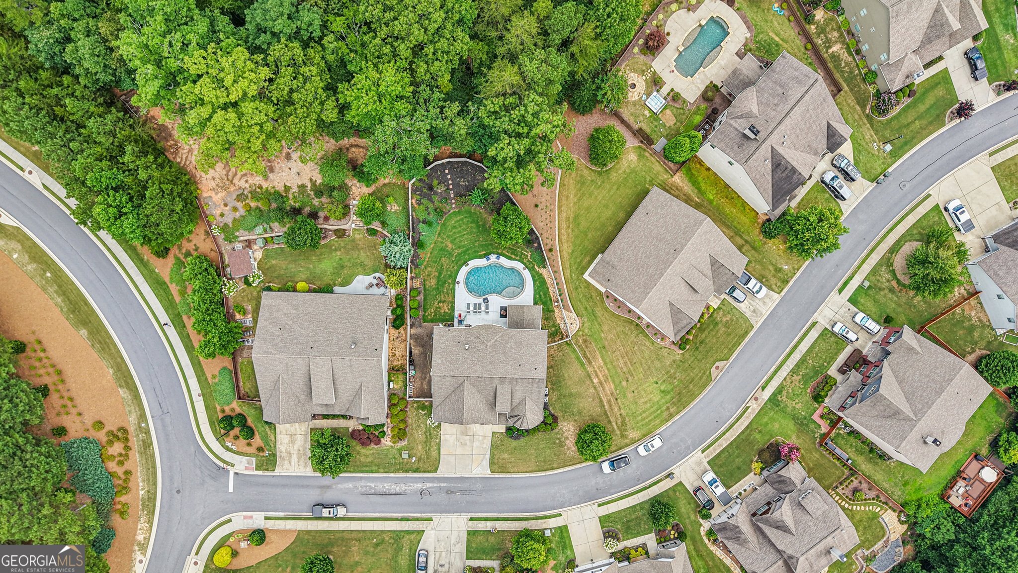 17 Lake Sydney Drive Dawsonville, GA 30534 - Photo 78 of 100 an aerial view of a house with a swimming pool
