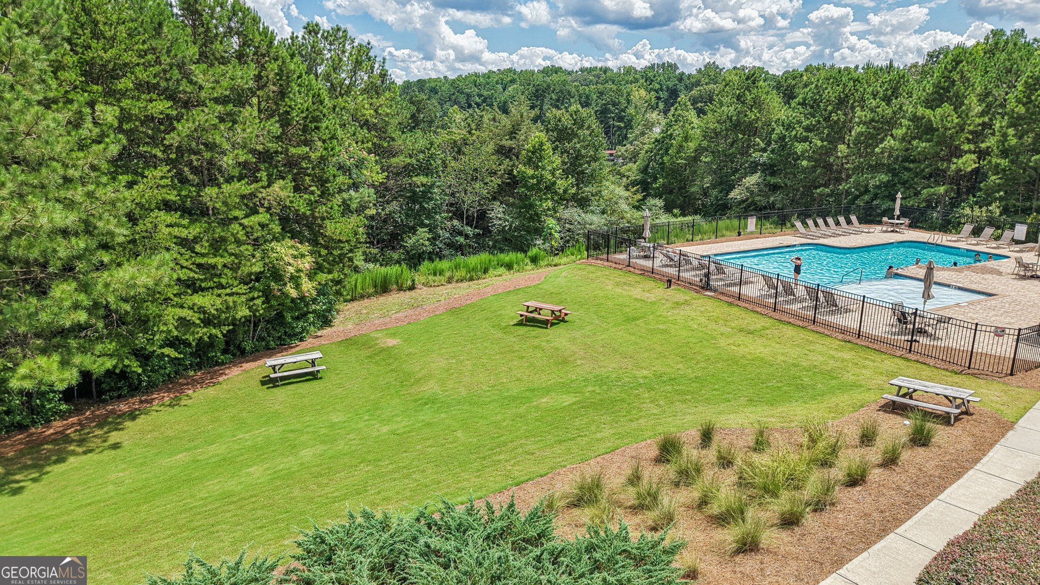 17 Lake Sydney Drive Dawsonville, GA 30534 - Photo 91 of 100 a view of a swimming pool with a yard