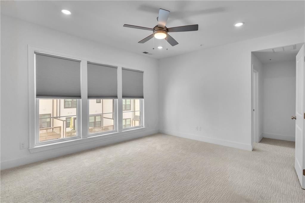545 Whitlox Road Northwest Atlanta, GA 30309 - Photo 22 of 65 a view of an empty room with a window