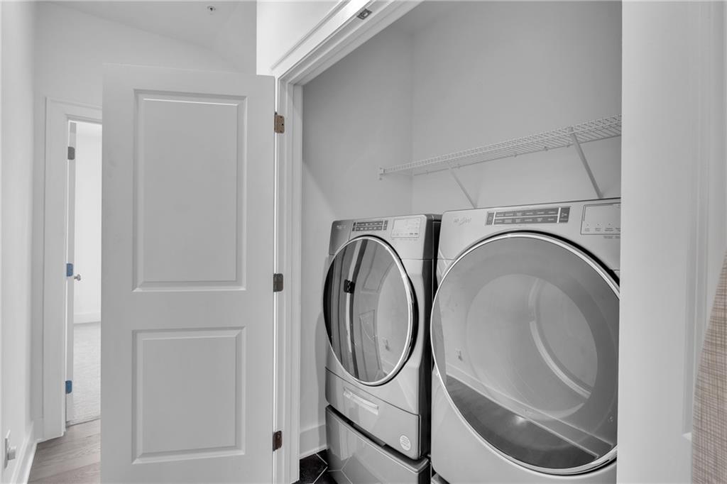 545 Whitlox Road Northwest Atlanta, GA 30309 - Photo 41 of 65 a utility room with dryer and washer