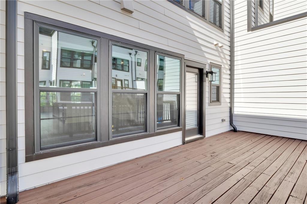 545 Whitlox Road Northwest Atlanta, GA 30309 - Photo 43 of 65 a view of outdoor space with wooden floor and windows