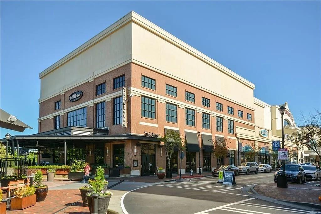 545 Whitlox Road Northwest Atlanta, GA 30309 - Photo 64 of 65 a front view of a building and a street
