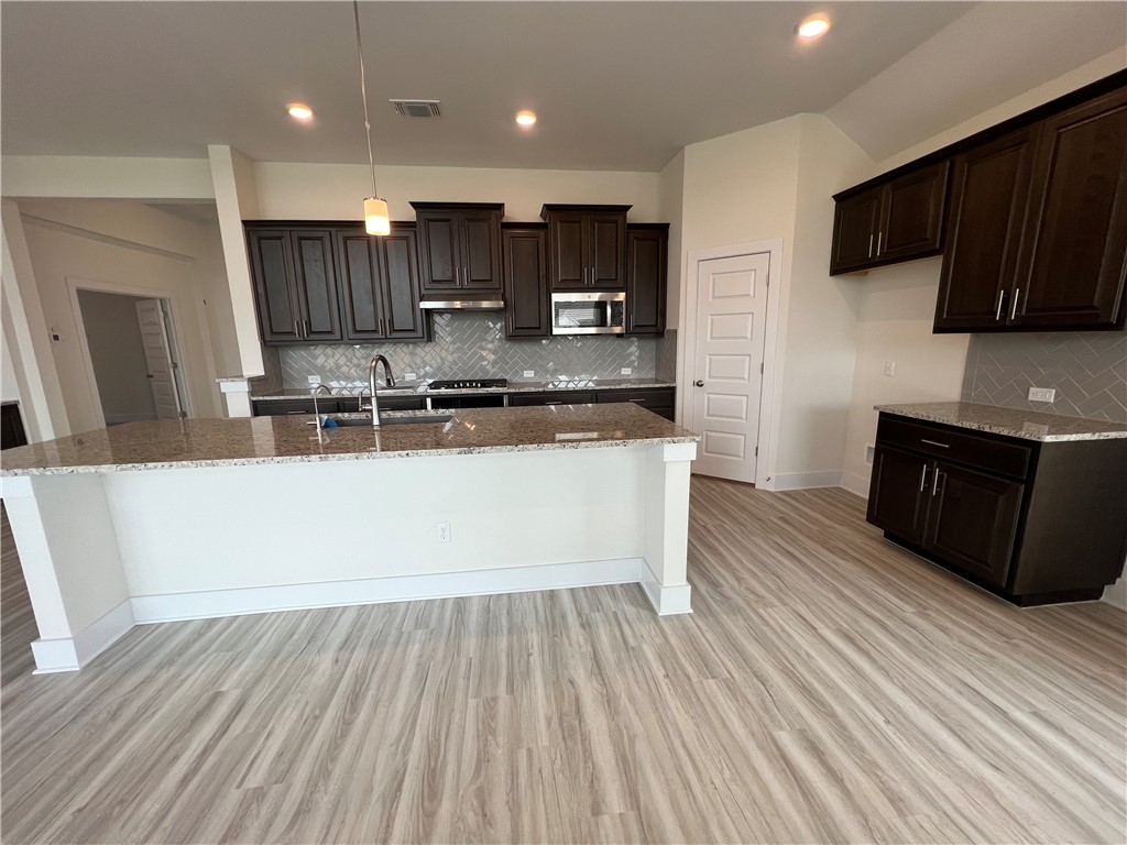 982 Wild Pecan Loop Buda, TX 78610 - Photo 8 of 16 Break fast area right off the kitchen