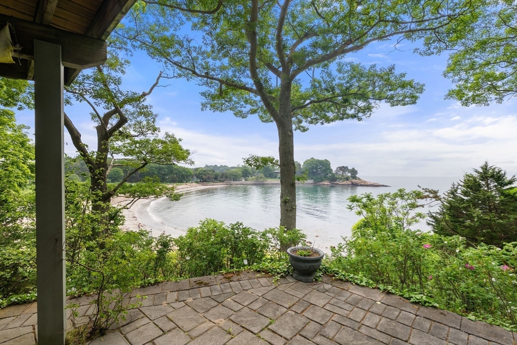 23 Ocean Street Manchester, MA 01944 - Photo 7 of 36 a lake view with a garden
