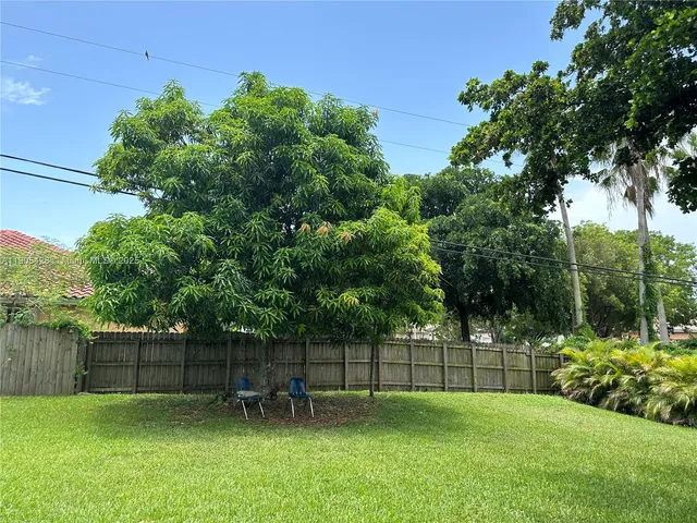a view of outdoor space and yard