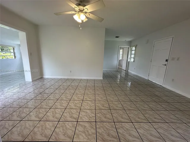 a view of an empty room and window