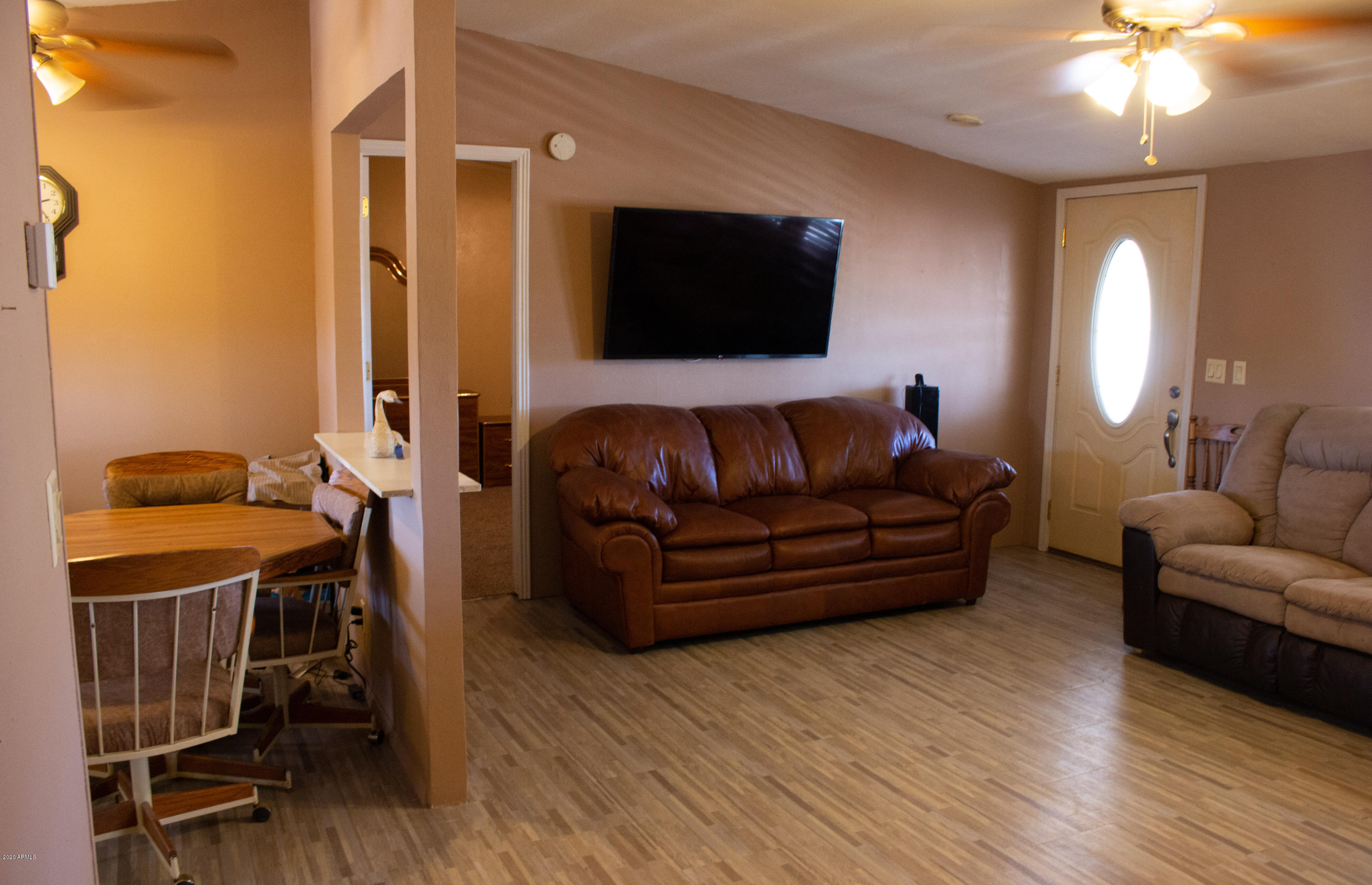 208 North Wickiup Road Apache Junction, AZ 85119 - Photo 4 of 34 Living Room Open to Kitchen