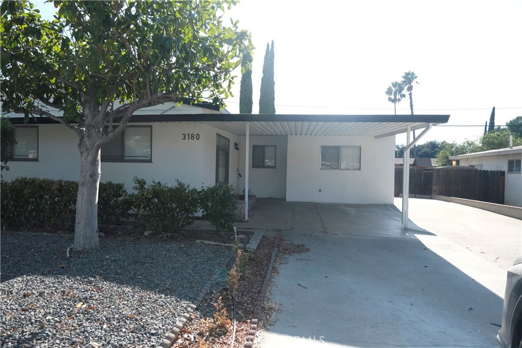3180 Jane Street Riverside, CA 92506 - Photo 27 of 28 a view of a house with a yard