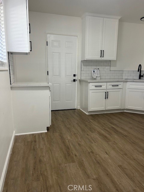 3180 Jane Street Riverside, CA 92506 - Photo 6 of 28 a view of a kitchen with wooden cabinets