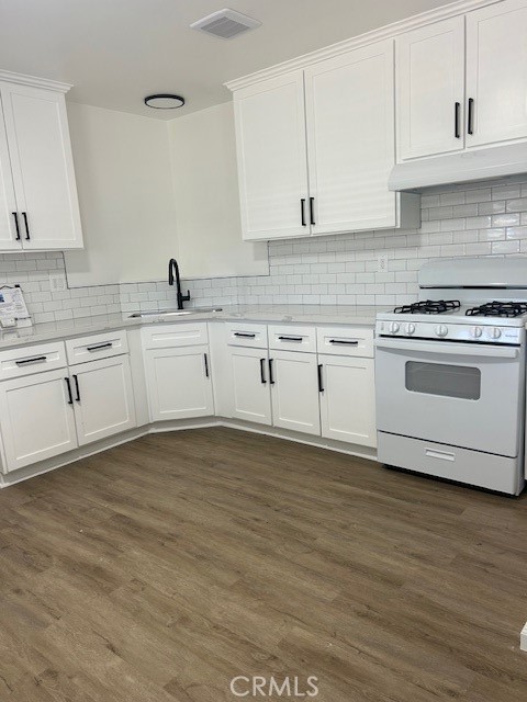3180 Jane Street Riverside, CA 92506 - Photo 8 of 28 a white kitchen with granite countertop stainless steel appliances