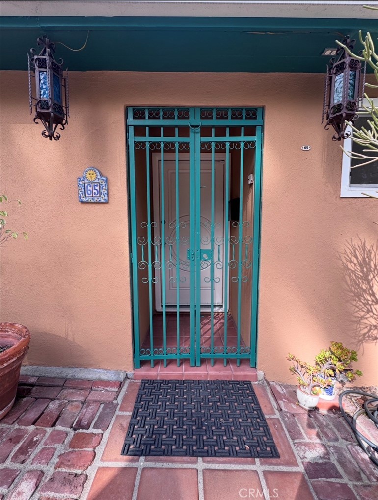 65 Grace Terrace Pasadena, CA 91105 - Photo 3 of 39 a view of a entryway door of the house